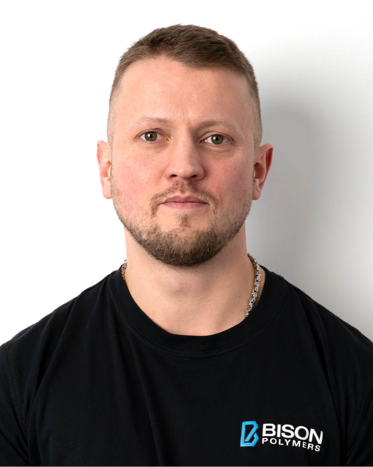 Alexander Diede wearing a black T-shirt with the BISON Polymers logo