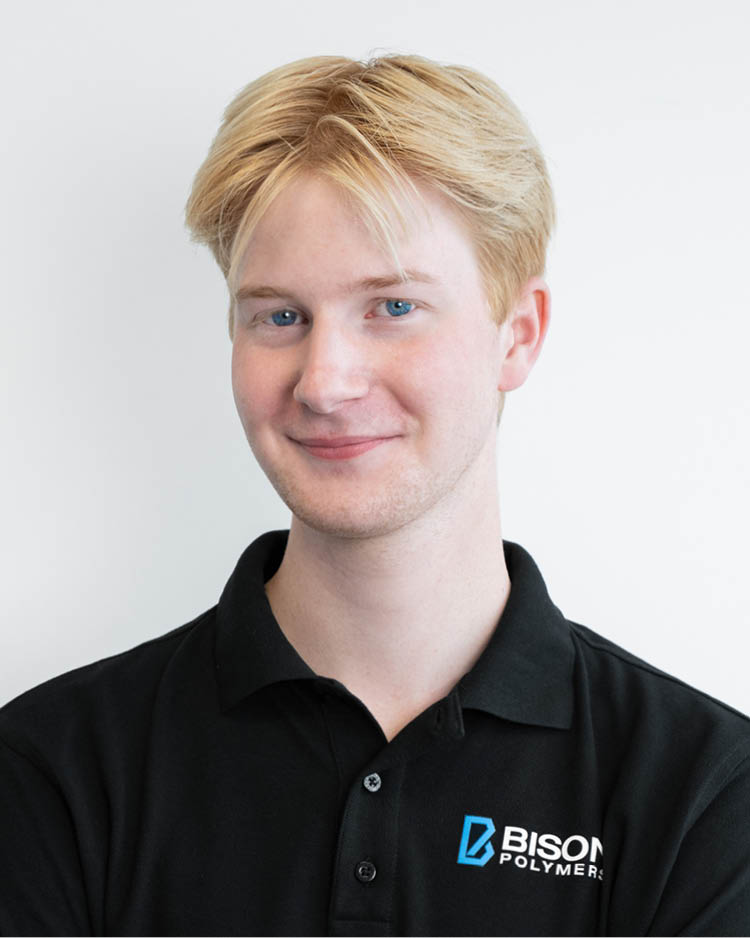 Fabio Ebener wearing a black polo shirt with the BISON Polymers logo